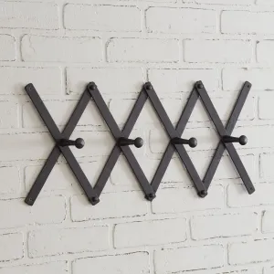 Charming Black Accordion Wall Rack for Your Cozy Farmhouse