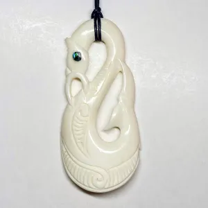 Handcarved Bone Carving Pendant w Paua Eye - Manaia