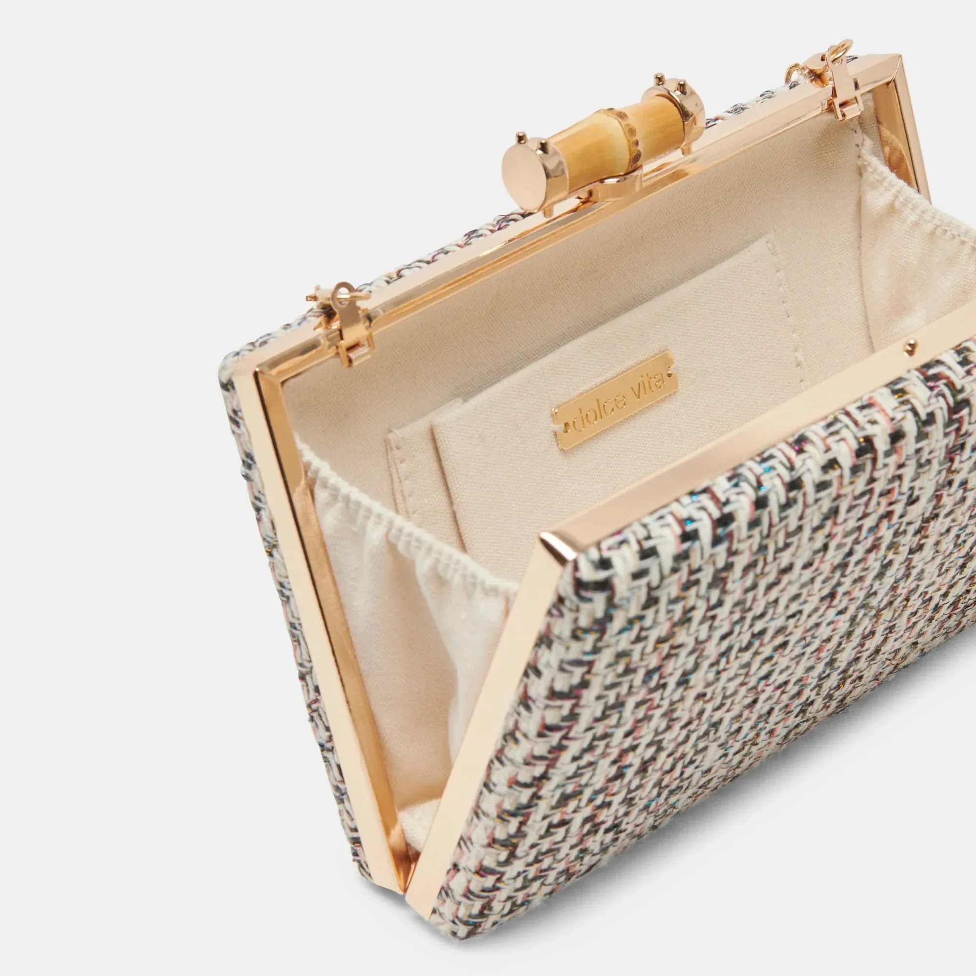 The Greta Woven Clutch by Dolce Vita - Black White
