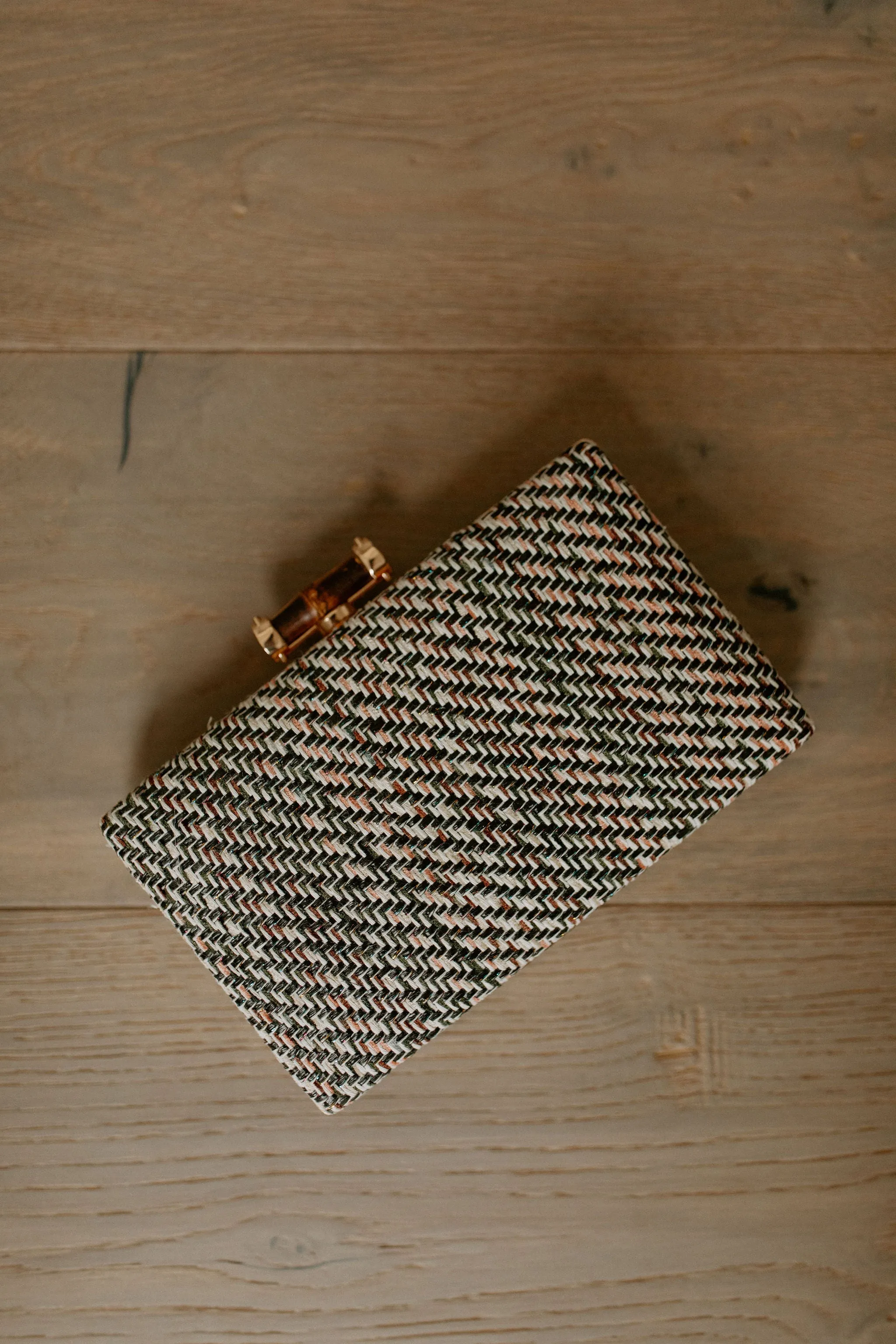 The Greta Woven Clutch by Dolce Vita - Black White