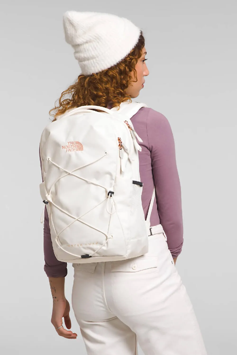 The North Face Jester Luxe Backpack for Women in Gardenia White/Burnt Coral Metallic | NF0A81E6-OUC